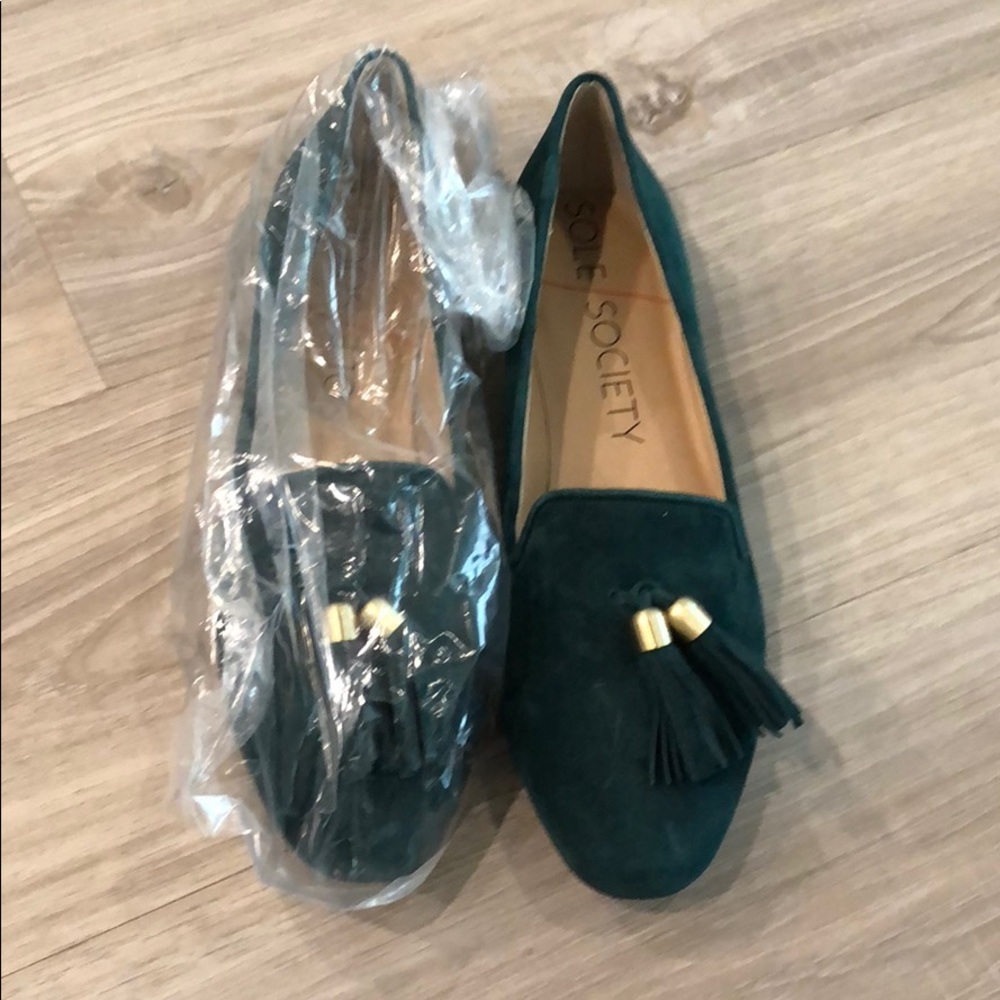 Emerald green loafers with tassels